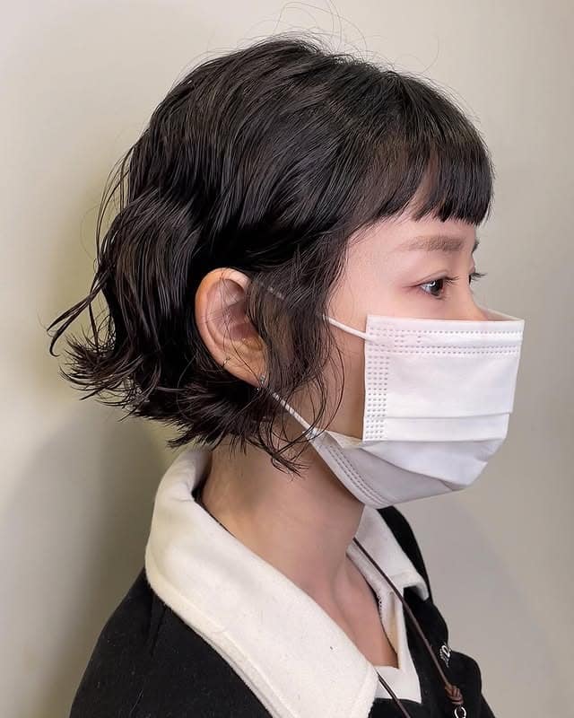 13. Wavy French Bob with Natural Black Hair - Short Hippie Hairstyles