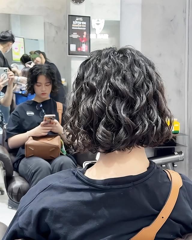 17. Rounded Wavy Bob with Natural Black Hair - Short Hippie Hairstyles