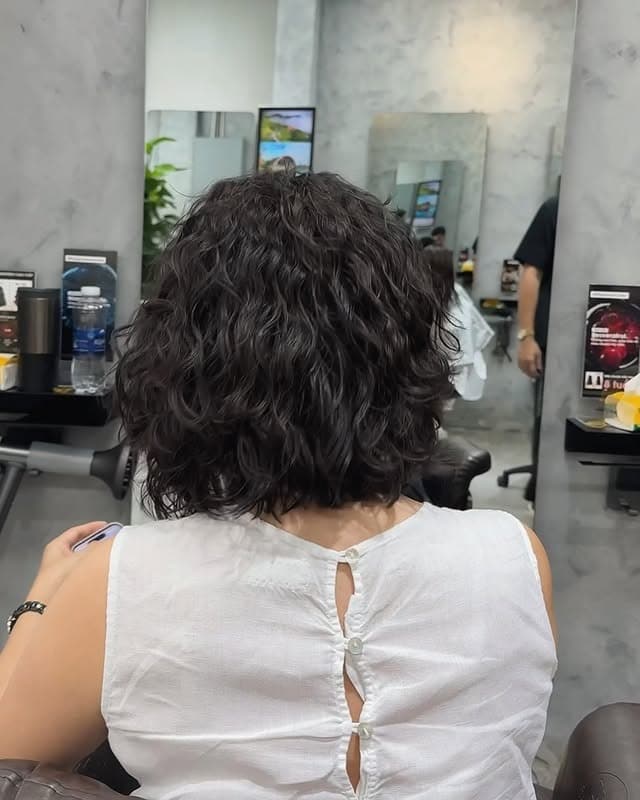 19. Layered Curly Bob with Dark Espresso Hair - Short Hippie Hairstyles