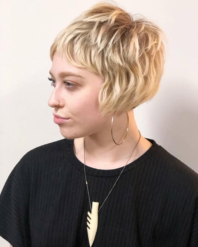 18. Creamy Blonde Wavy Shaggy Pixie - Shaggy Pixie Hairstyles