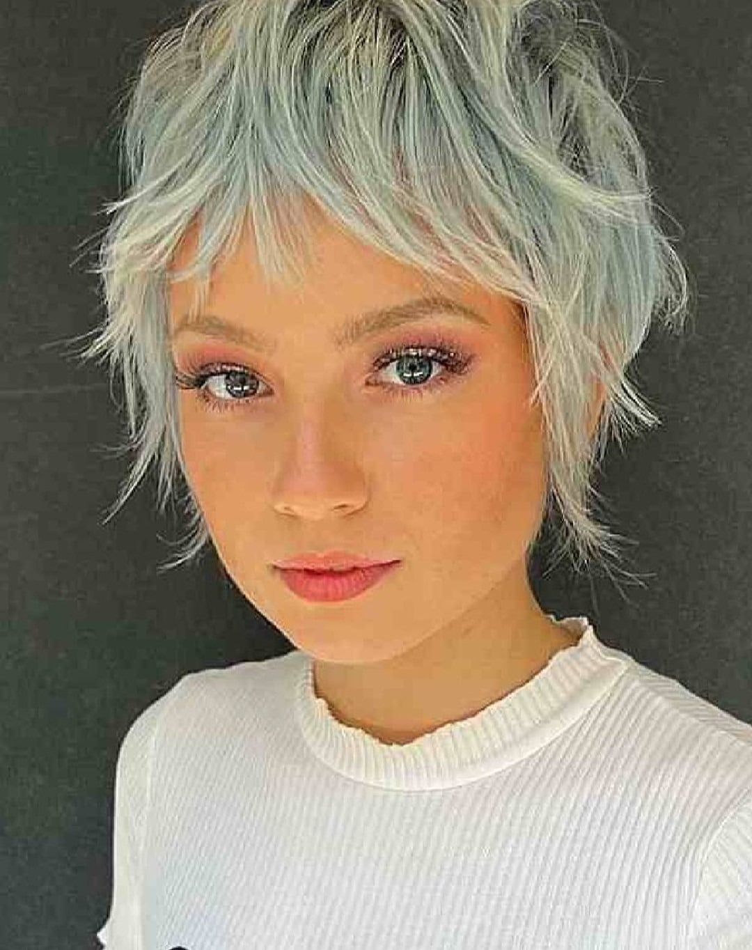 22. Silver Blonde Feathered Shaggy Pixie - Shaggy Pixie Hairstyles