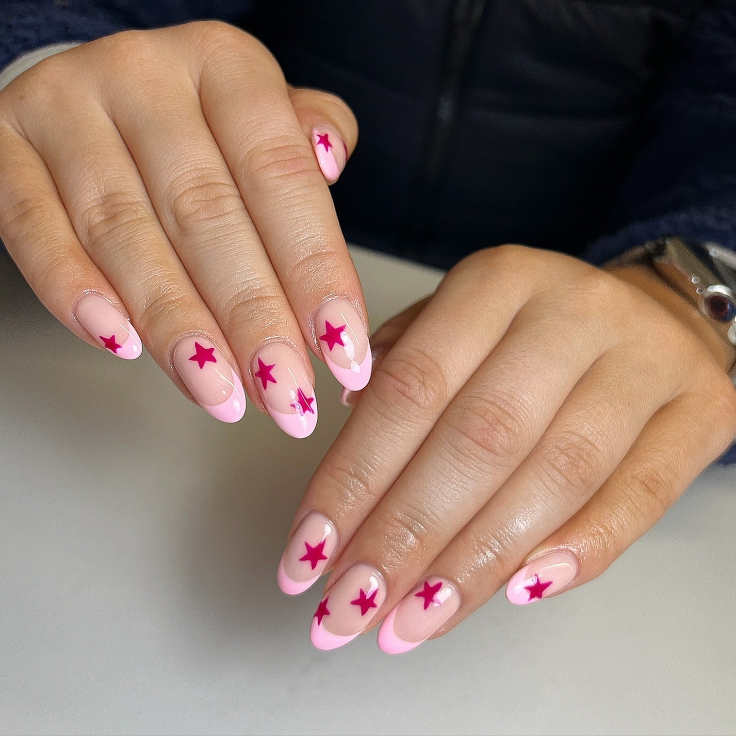 2. Pink French Manicure with Magenta Star Accents - french-manicure-nail-ideas