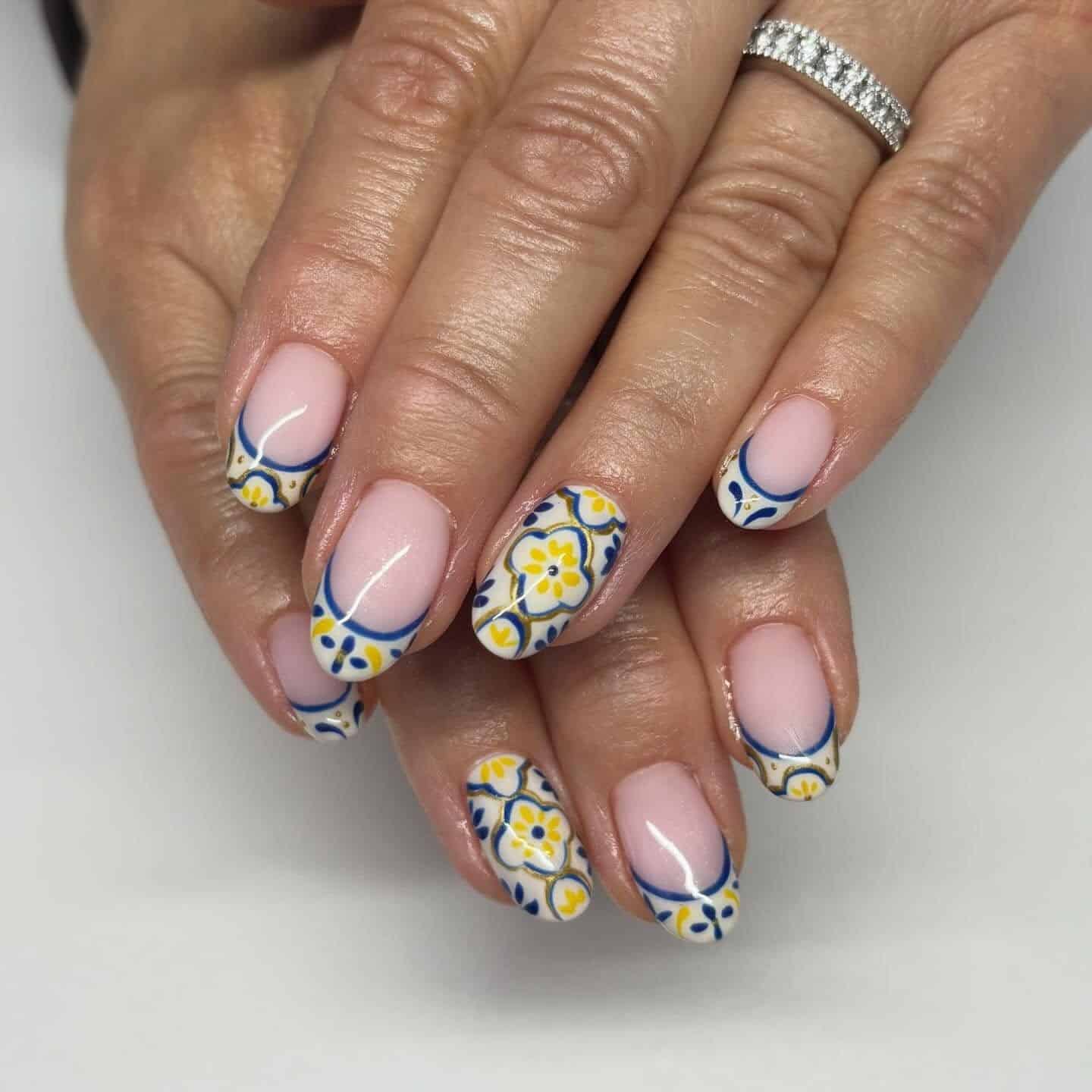 16. Blue and Yellow Mediterranean French Manicure - french-manicure-nail-ideas