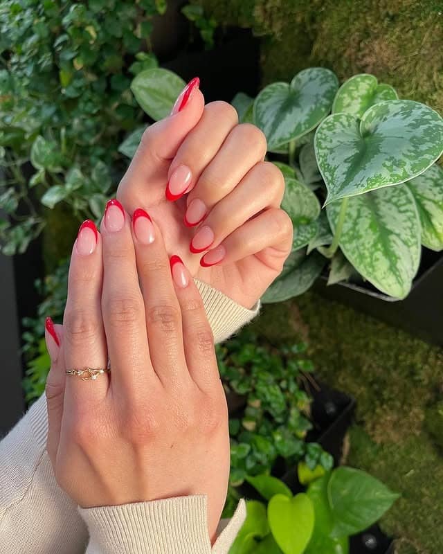 17. Cherry Red French Manicure on Almond Nails - french-manicure-nail-ideas