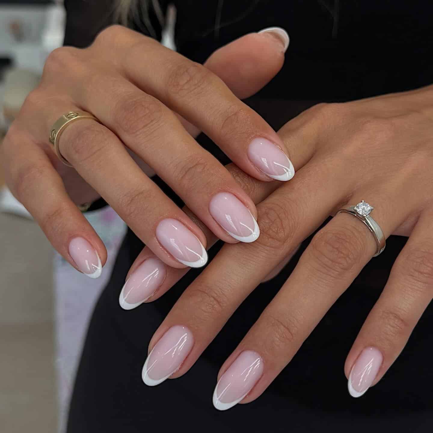 21. Soft Pink Oval French Manicure with Classic White Tips - french-manicure-nail-ideas