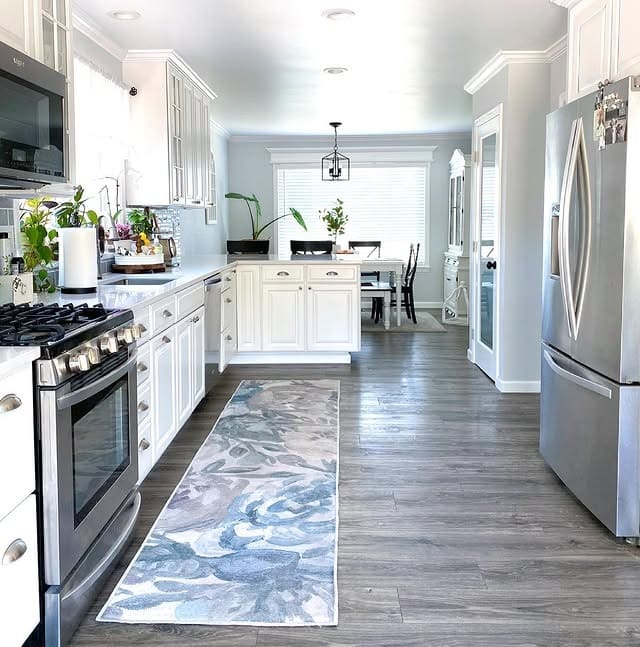 1. Soft Gray and White Kitchen with Coastal-Inspired Accents - gray kitchen ideas