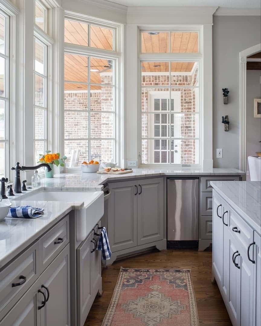 3. Classic Gray Kitchen with Warm Wood Floors - gray kitchen ideas