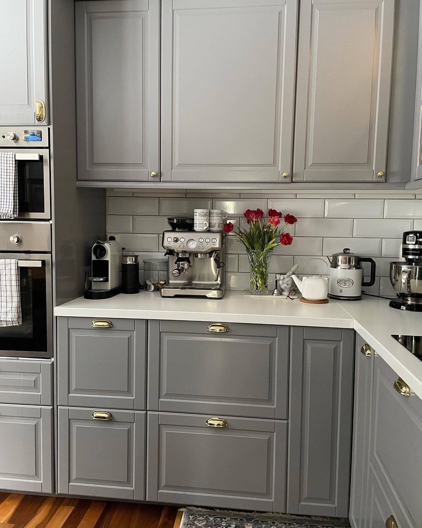 11. Classic Gray Shaker Kitchen with Brass Hardware - gray kitchen ideas