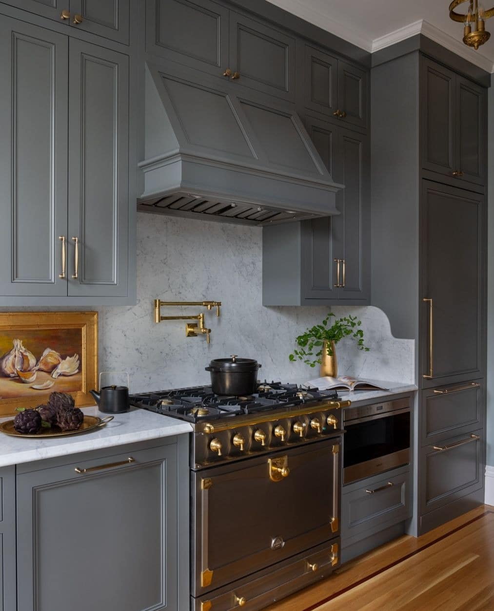 15. Dark Gray Luxury Kitchen with Gold Accents - gray kitchen ideas