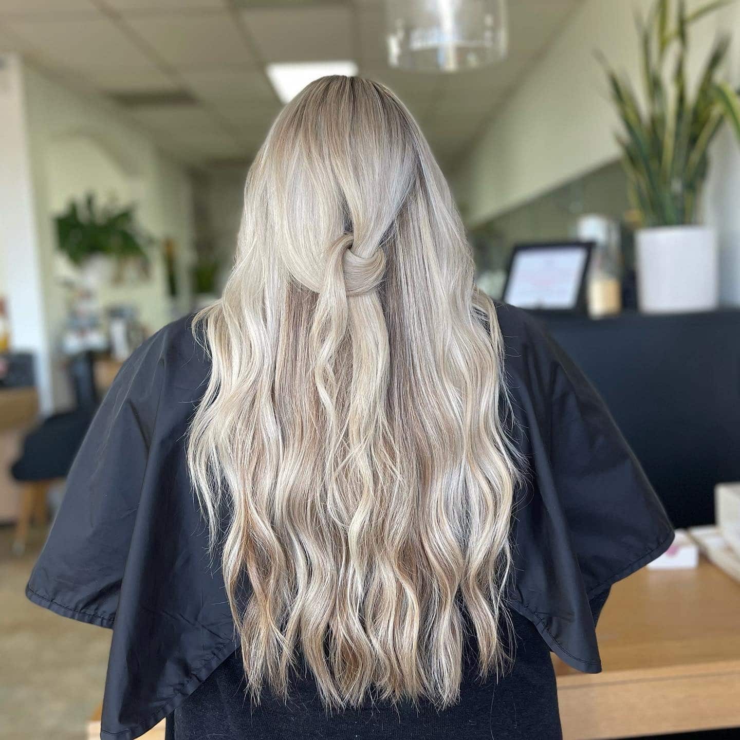 2. Smoky Icy Blonde Balayage Waves - Icy Blonde Hair Color