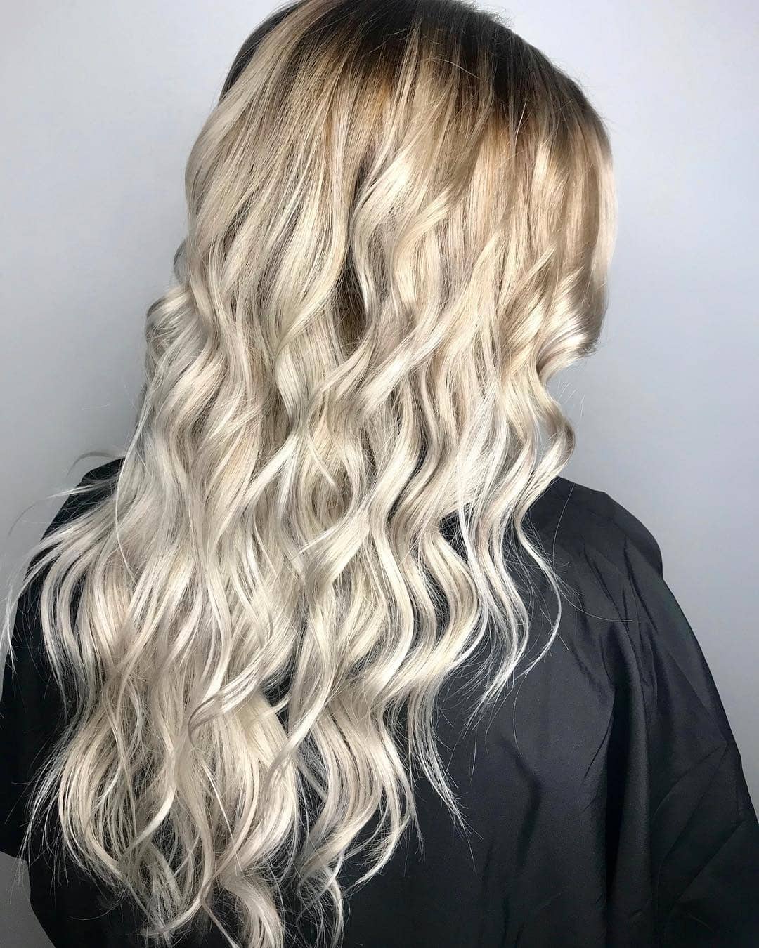 4. Icy Blonde Root Melt with Beach Waves - Icy Blonde Hair Color