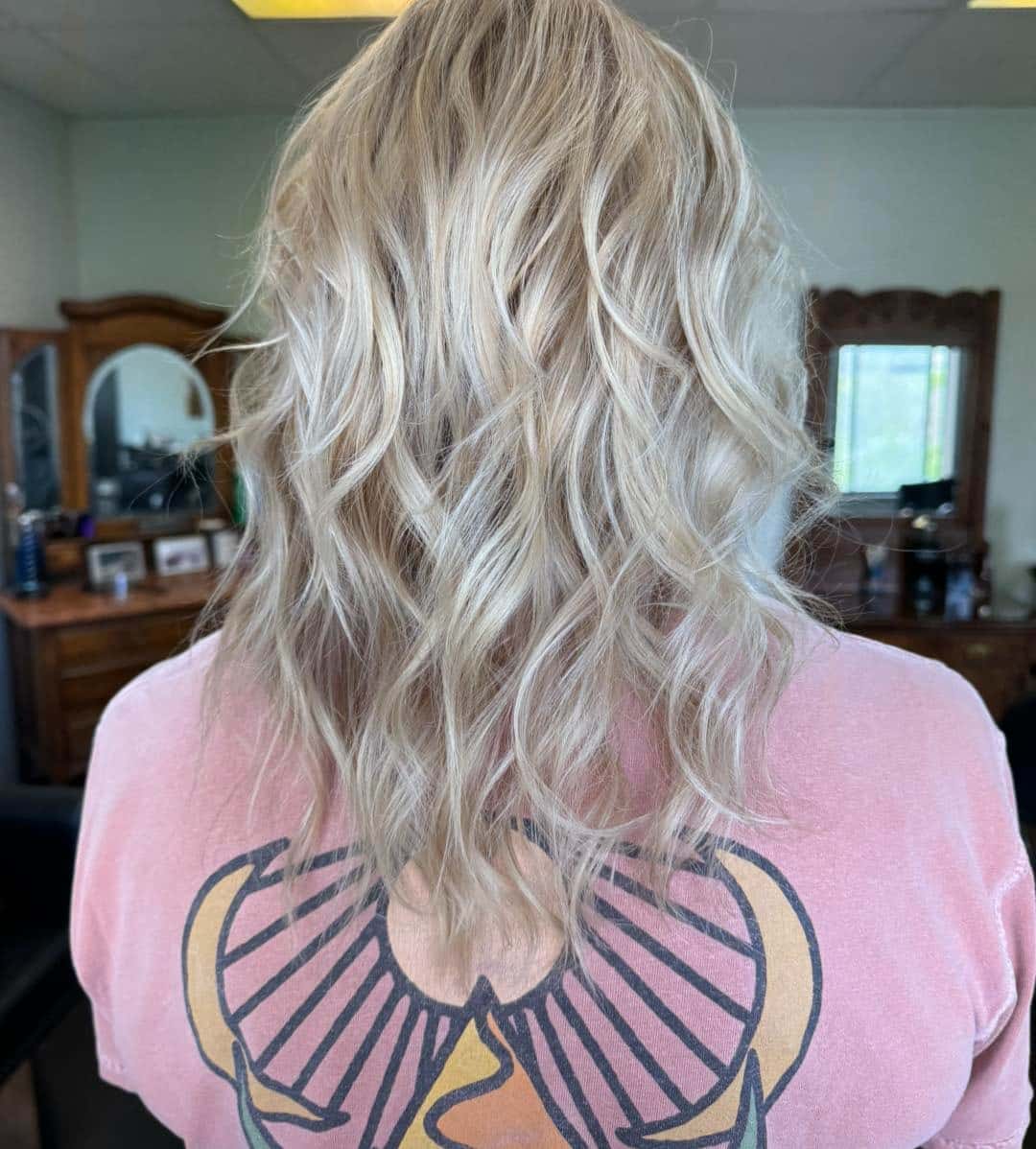 6. Textured Icy Blonde Wavy Lob - Icy Blonde Hair Color