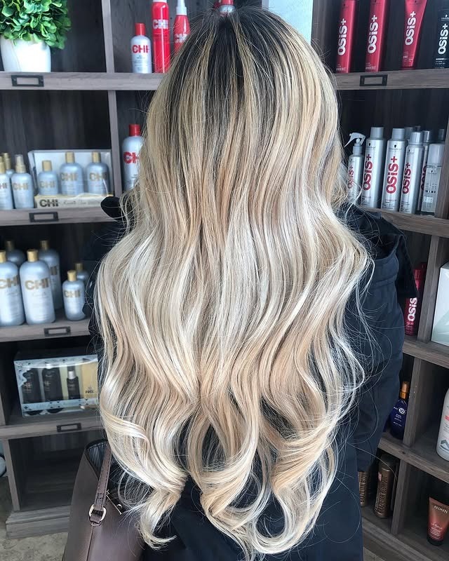 8. Dimensional Icy Blonde Blowout - Icy Blonde Hair Color
