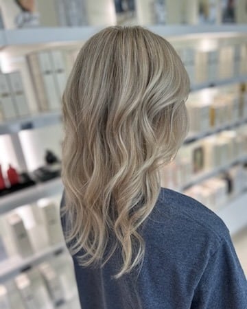 13. Ash Icy Blonde Layered Waves - Icy Blonde Hair Color