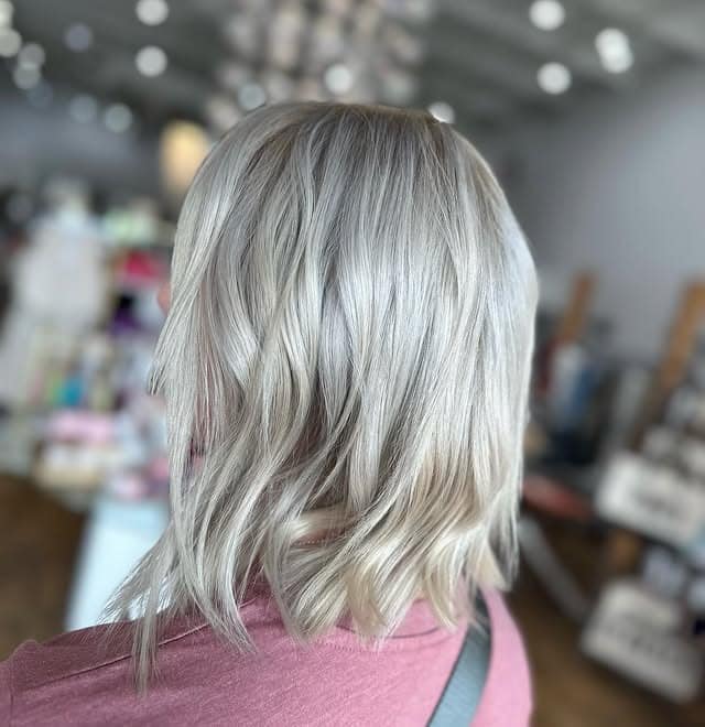 14. Pearl Icy Blonde Wavy Lob - Icy Blonde Hair Color