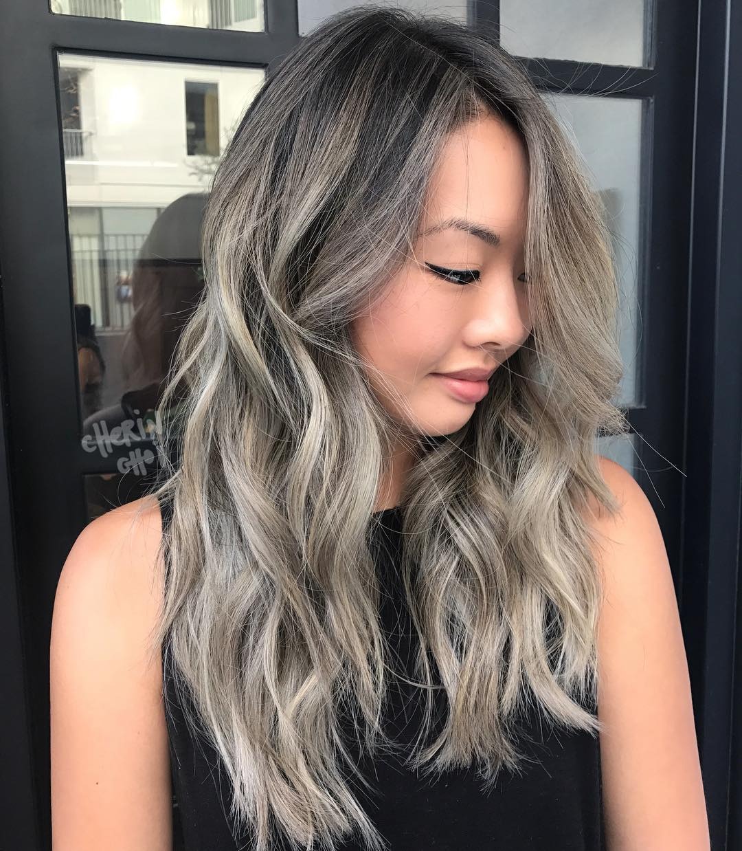 18. Smoky Icy Blonde Layered Shag - Icy Blonde Hair Color