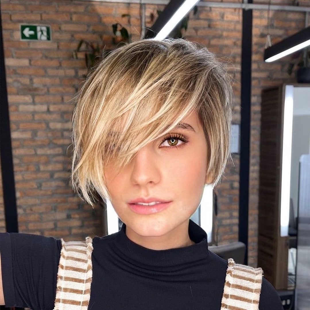 2. Rooted Blonde Side-Swept Pixie Bob - Side Swept Pixie