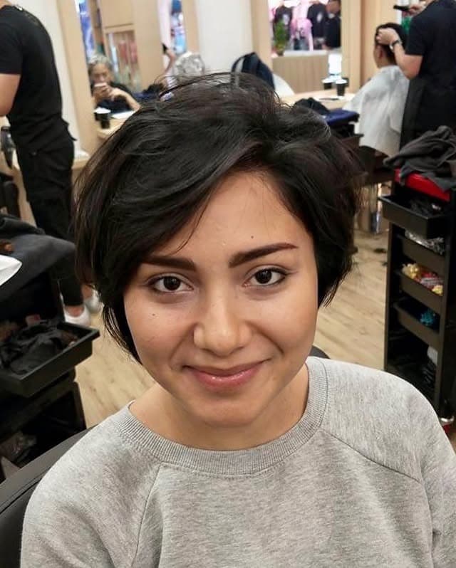 7. Soft Black Textured Side-Swept Pixie - Side Swept Pixie