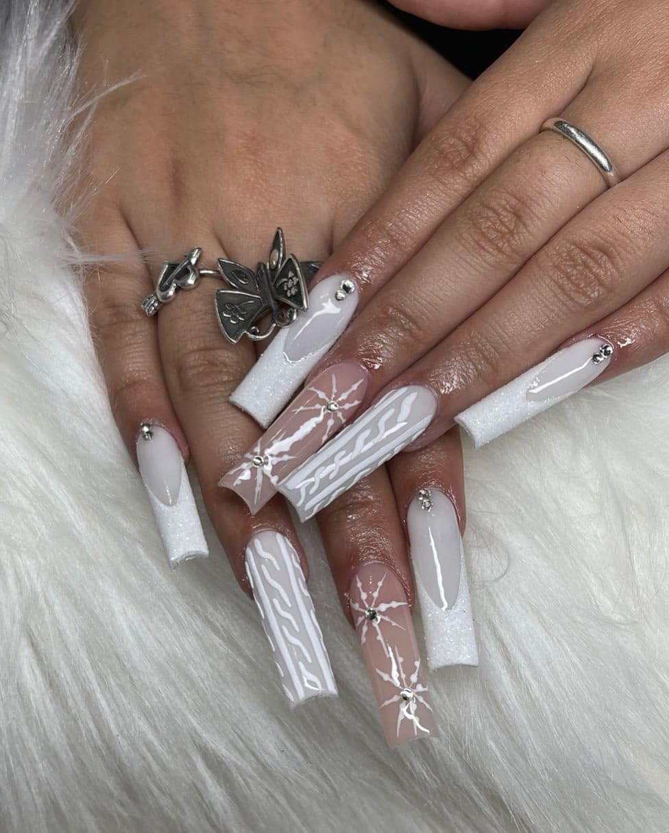 2. Icy White Sweater Nails with Crystal Snowflakes - white winter nail ideas