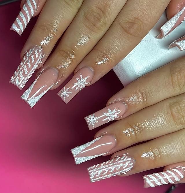 5. Pink and White Snowflake Sweater Nails - white winter nail ideas