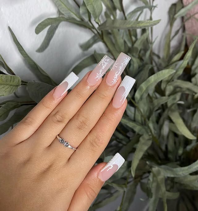 6. White Snowflake French Coffin Nails - white winter nail ideas