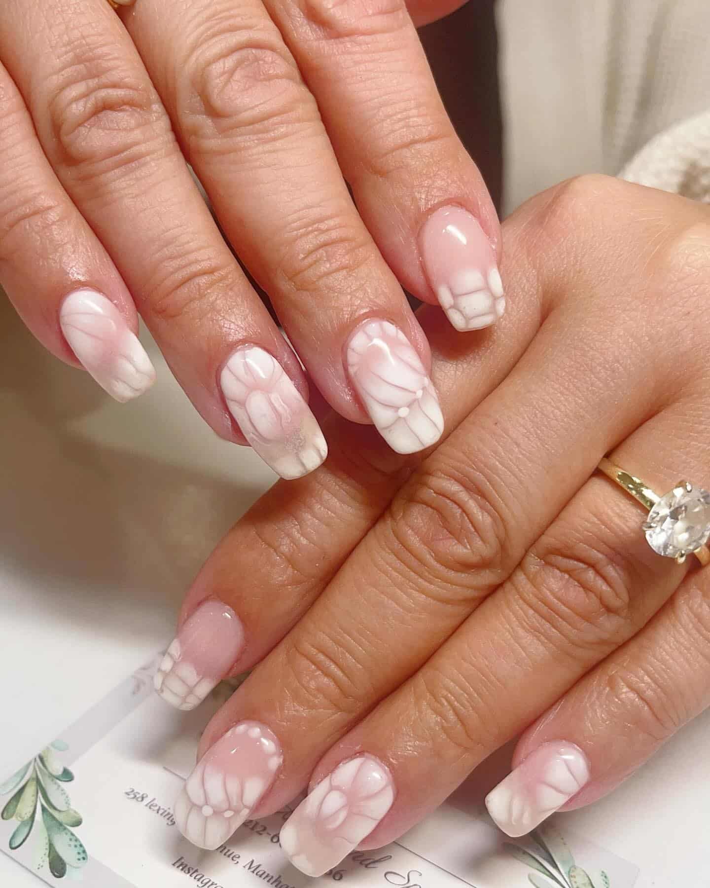 8. Soft White 3D Sweater Nails - white winter nail ideas
