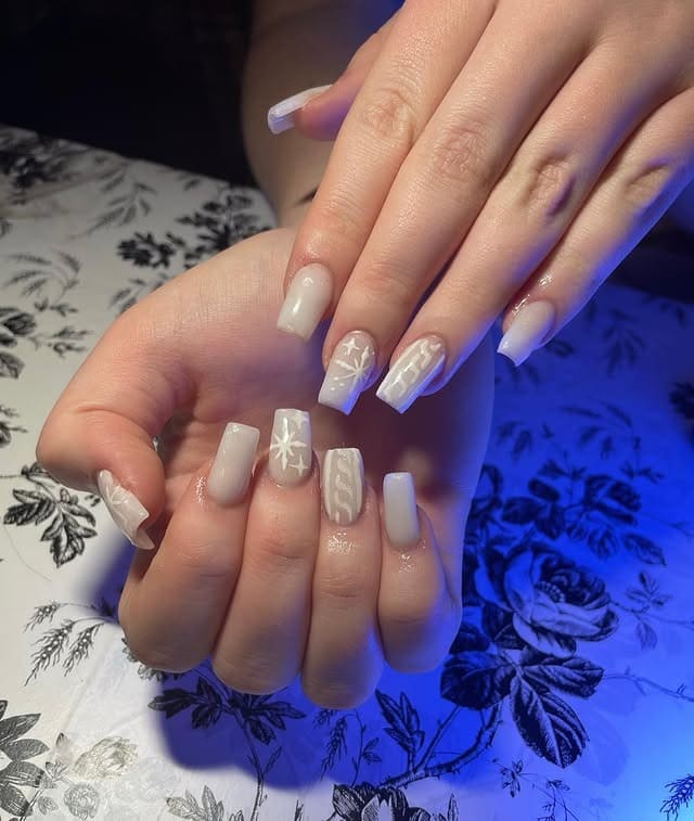 9. Frosted White Snowflake Sweater Nails - white winter nail ideas