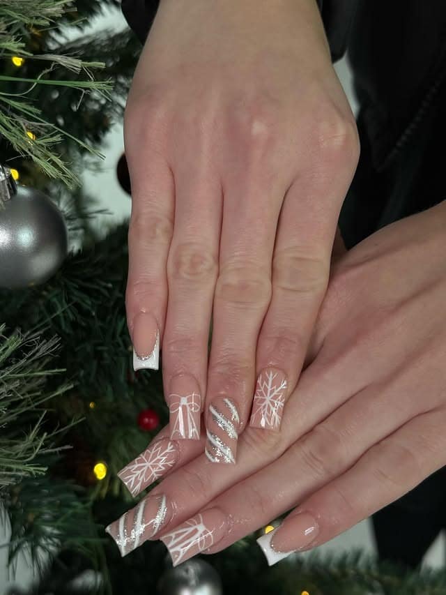 12. White Snowflake and Silver Swirl Coffin Nails - white winter nail ideas
