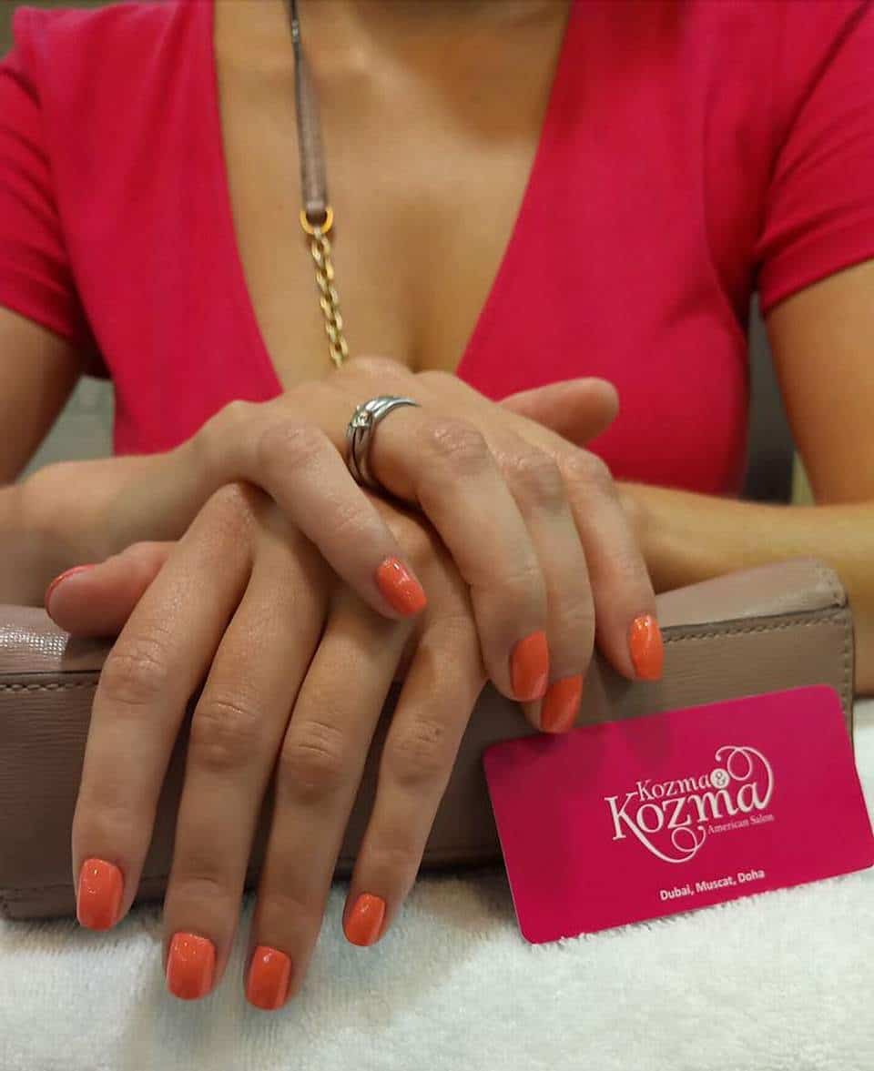 3. Coral Orange Short Square Nails - orange color nail ideas
