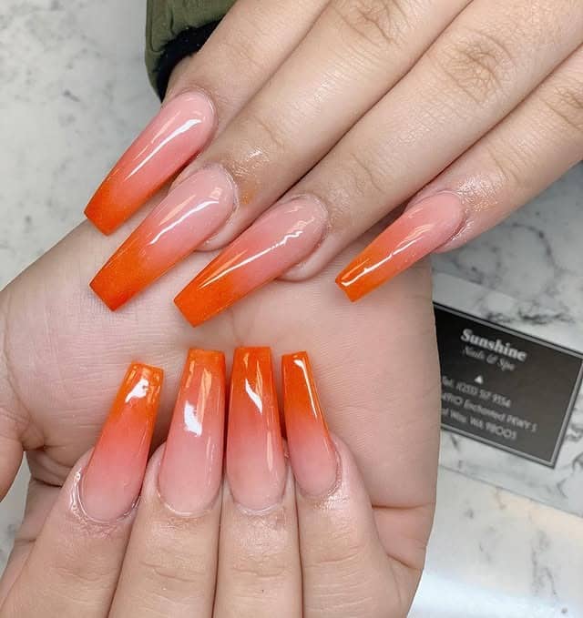 9. Orange Ombre Coffin Nails - orange color nail ideas