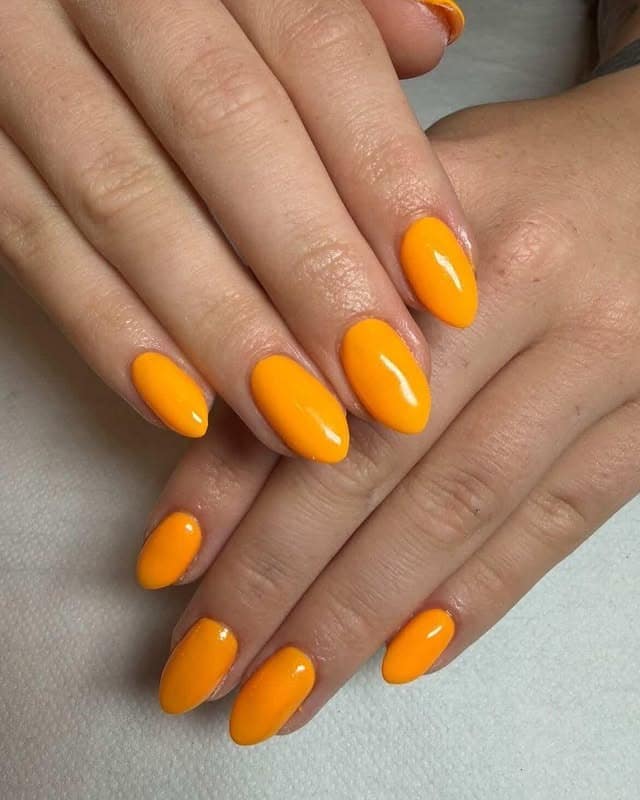 15. Mango Orange Almond Nails - orange color nail ideas