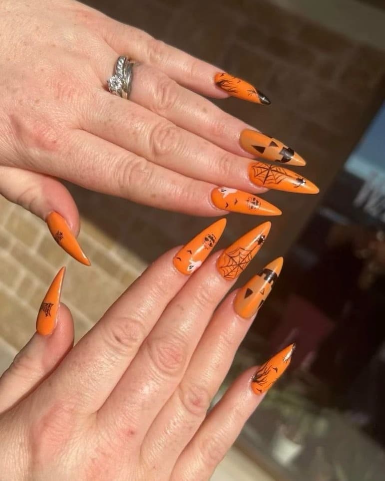 16. Halloween Orange Stiletto Nail Art - orange color nail ideas