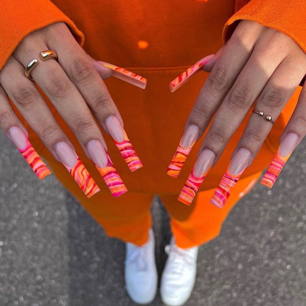18. Orange and Pink Marble French Tip Coffin Nails - orange color nail ideas