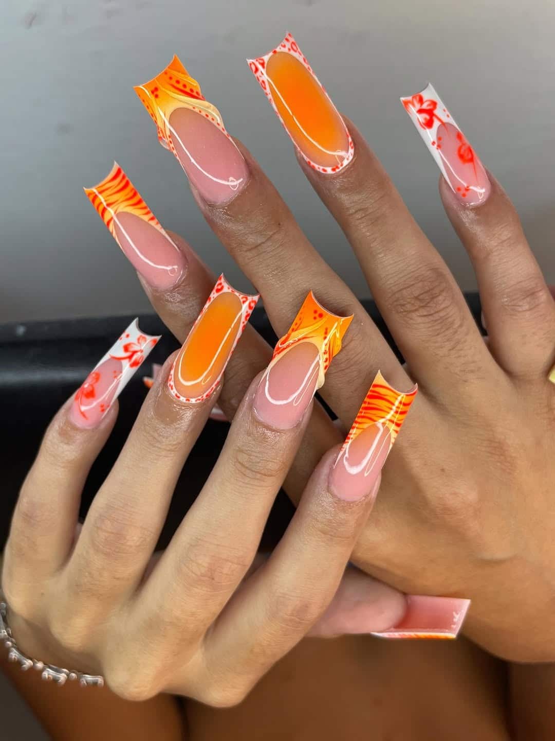 21. Orange Art Deco French Tip Coffin Nails - orange color nail ideas