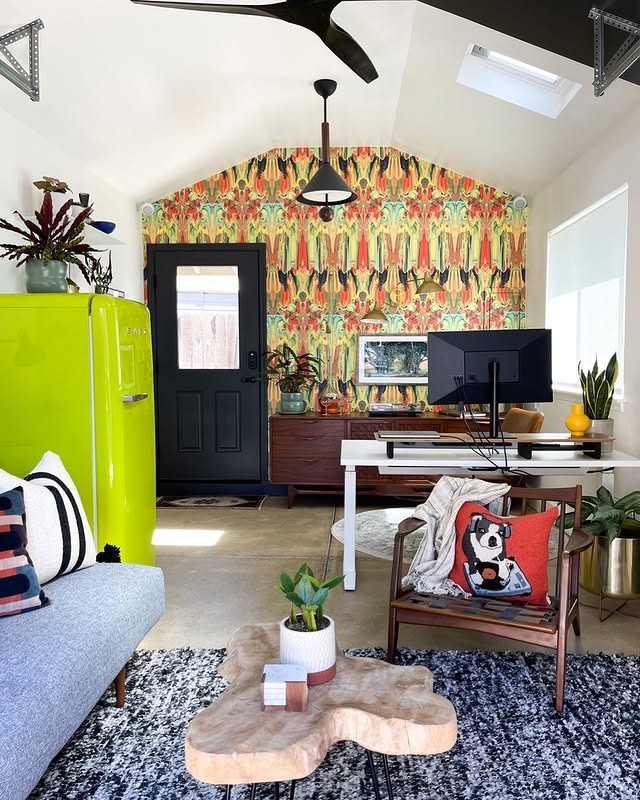 2. Retro Green and Black Garage Office with Statement Wallpaper - garage office ideas
