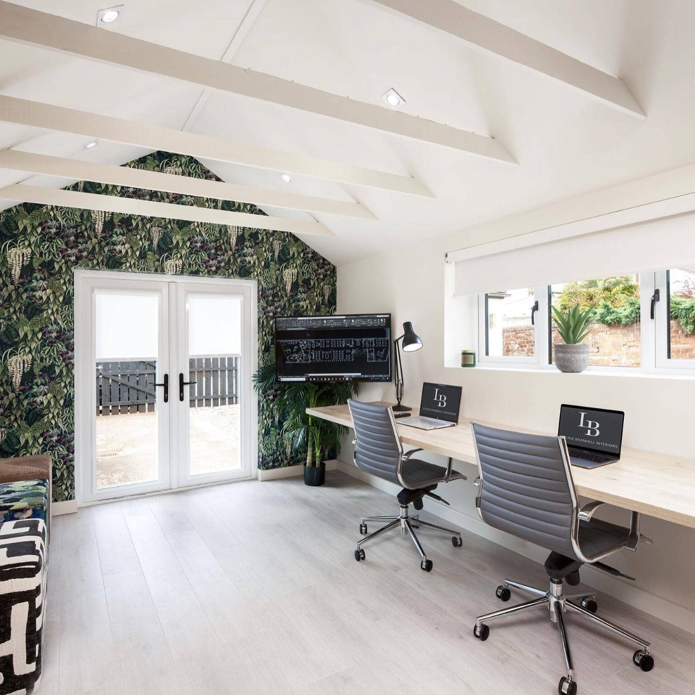 5. Botanical Green and Cream Shared Garage Office - garage office ideas