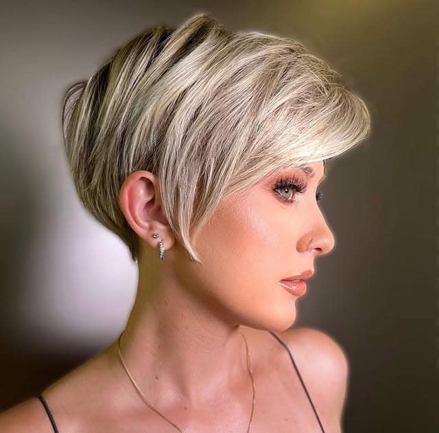 13. Platinum Blonde Side-Swept Pixie Bob - Pixie Bob Haircut