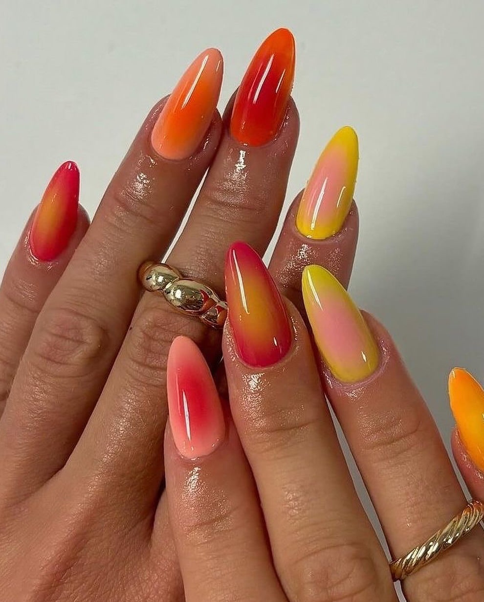 6. Sunset Ombre Almond Nails - short spring break nail ideas