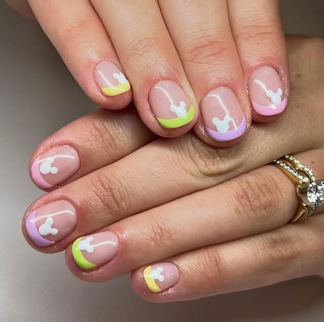 8. Pastel Character French Short Nails - short spring break nail ideas