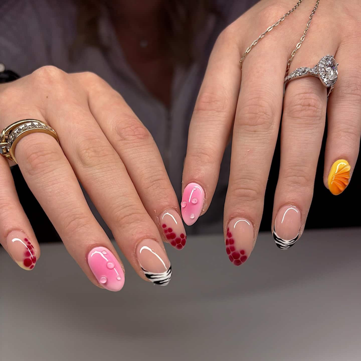 12. Pink Zebra Mix Almond Nails - short spring break nail ideas