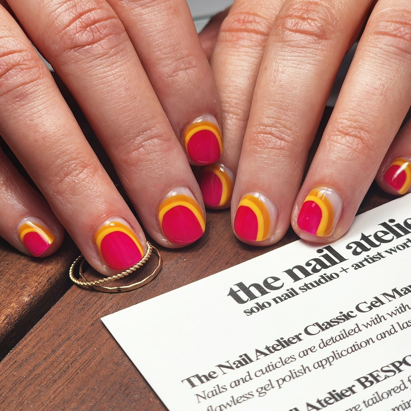 22. Retro Sunset Curve Short Nails - short spring break nail ideas