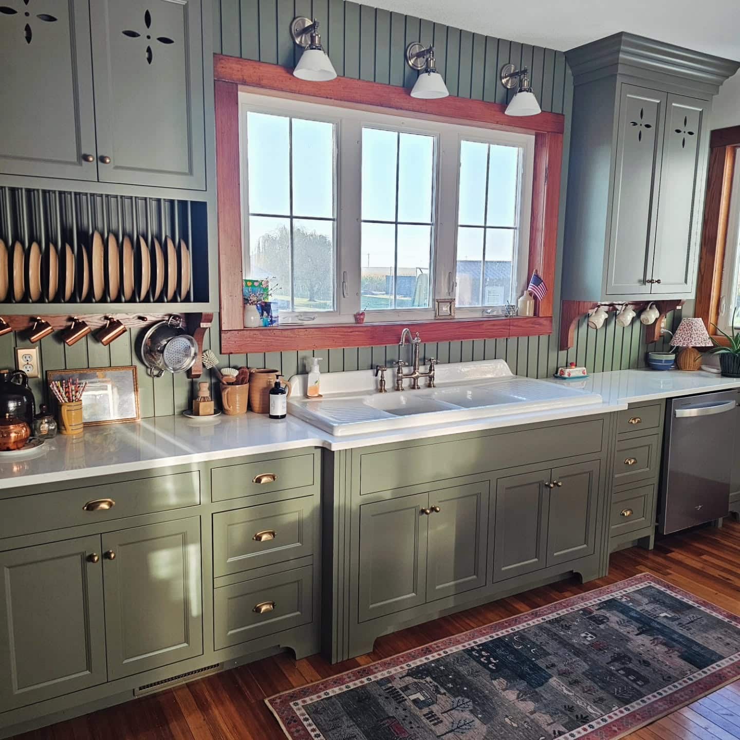21. Olive Green Cottage Kitchen with Wood Trim Accents - cottage kitchen ideas