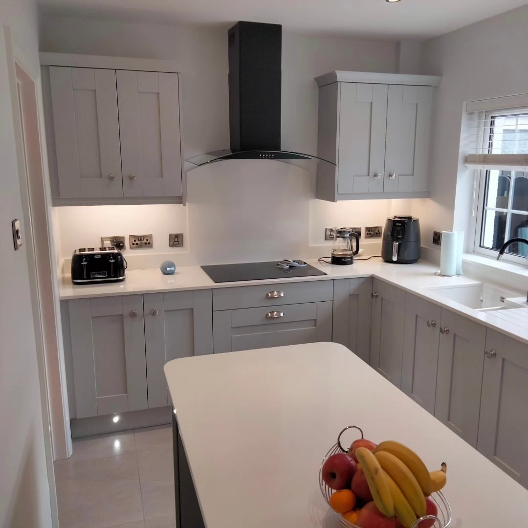 3. Light Grey Shaker Kitchen With White Quartz Surfaces - light grey kitchen ideas