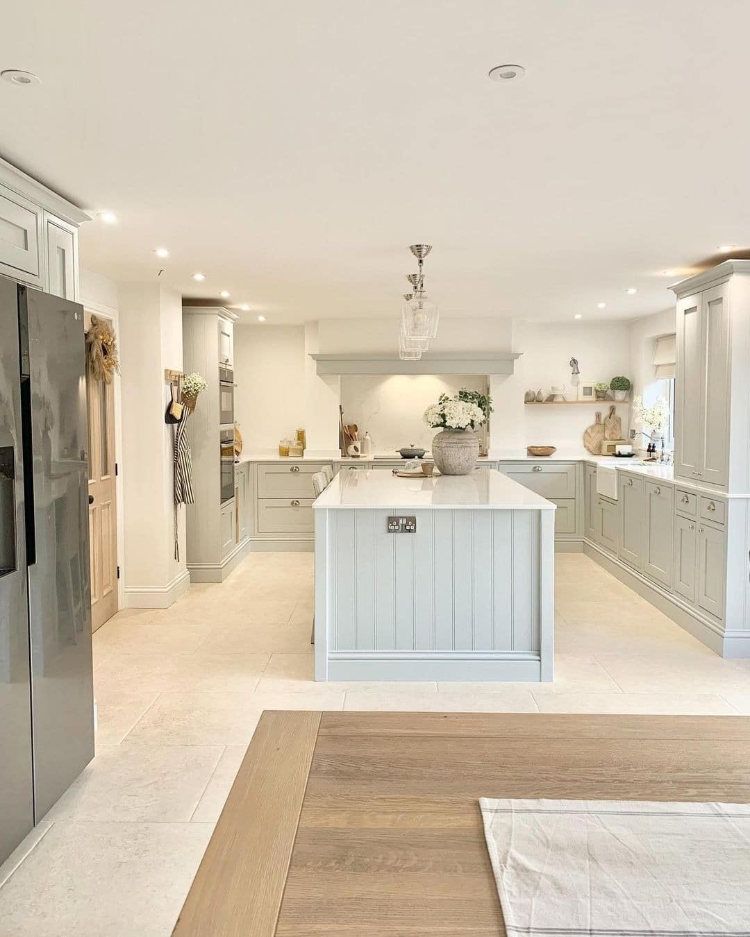 19. Classic Light Grey Kitchen With Large Central Island - light grey kitchen ideas