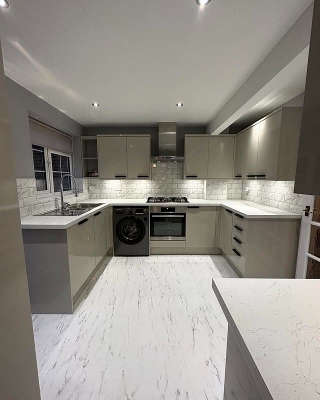 20. Contemporary Light Grey Kitchen With Marble-Effect Flooring - light grey kitchen ideas