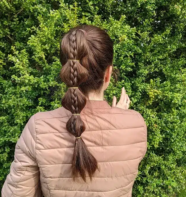 10. Braided Bubble Ponytail on Medium Brown Hair - Bubble Ponytail Hairstyles