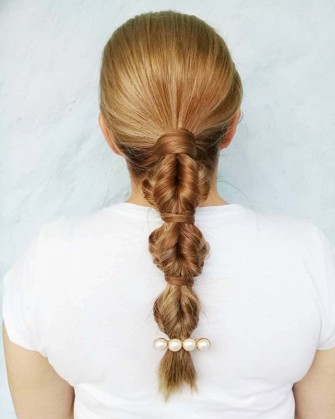 13. Twisted Bubble Ponytail on Honey Blonde Hair - Bubble Ponytail Hairstyles