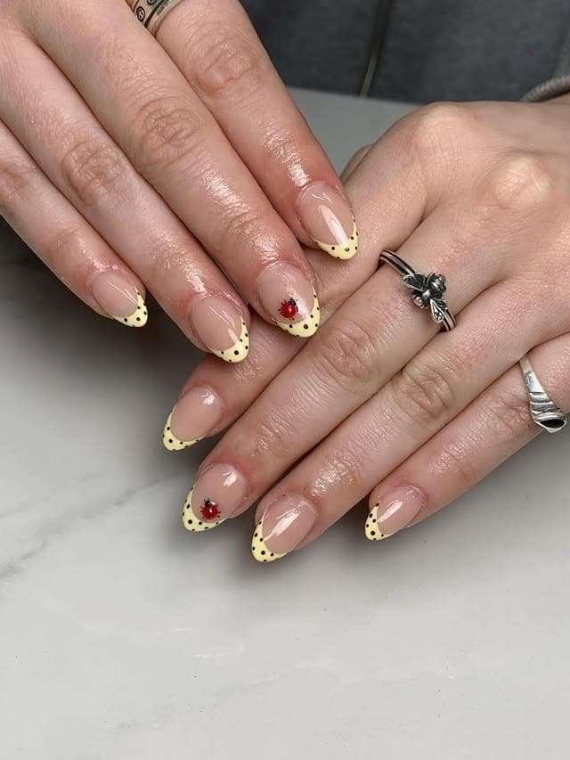 2. Yellow Polka Dot French Tip Ladybug Nails - yellow nail ideas