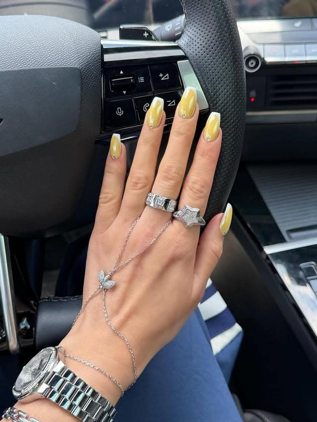 5. Glossy Yellow Ombre Chrome Almond Nails - yellow nail ideas