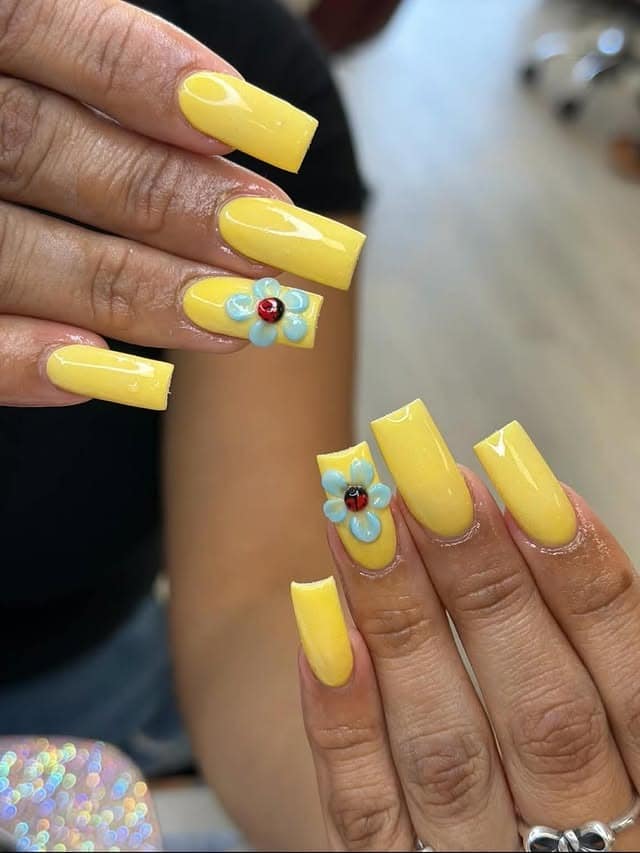 11. Glossy Lemon Yellow Flower and Ladybug Square Nails - yellow nail ideas